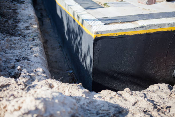 Professional Interior Drainage System technician working in Clay City, IN